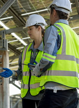 Two Greenlay Solar engineers discussing latest project